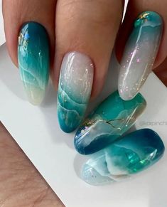 Zodiac-Inspired Nail Designs for Every Sign - The Catalog Nail Art Designs Turquoise, Turquoise White Nails, Marble Turquoise Nails, Aqua Marble Nails, Turquoise And Blue Nails, Fluorite Nails, Ocean Nail Art Sea, Jelly Gel Nail Designs, Blue Green Nails Designs