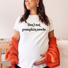 This shirt is perfect for your baby announcement photo this Fall season! These shirts are not "maternity" and are unisex sizing, so please use our size chart to determine the most appropriate size for you & that gorgeous baby bump!  PRODUCT DESCRIPTION ✿ Bella + Canvas tee ✿ 100% Cotton, Unlined, Light Fabric ✿ Unisex sizing; Relaxed fit with stretch ✿ Runs true to size; size up for an oversized look ✿ Direct-to-Garment printing (ink directly printed into the fabric = no fading or peeling off!) Halloween Pregnancy Shirt, Fall Pregnancy, Fall Pregnancy Announcement, Baby Fall, Bump Photos, Baby Announcement Photos, Pregnant Halloween, Fall Maternity, Maternity Shirt