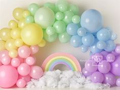 there are balloons and rainbows in the room