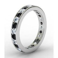 a wedding ring with black and white diamonds