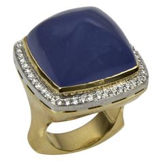 Magnificent Classic Dress Ring, centering a large 39.02 carat Sugarloaf cabochon-cut Blue Chalcedony, surrounded by 48 round brilliant-cut diamonds with an approx total weight of 0.48ct; artistically hand crafted in 18k yellow and white gold; Ring size 7. Timeless and outstanding in every way! Stone Ring Design, Heart Shaped Diamond Ring, Oval Cut Diamond Rings, Oval Halo Engagement Ring, Diamond Gold Ring, Diamond Ring Princess Cut, Smoky Quartz Ring, Coach House, Rose Gold Diamond Ring