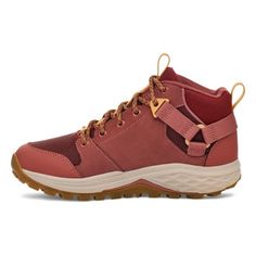 a women's red hiking shoe with brown laces