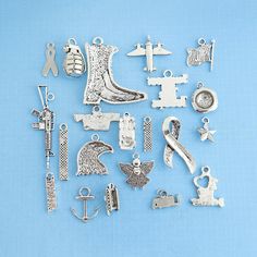 many different types of charms on a blue background