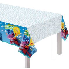 the sesame street tablecloth is shown with characters on it