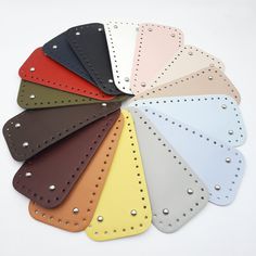 the colors of leather with rivets are arranged in a circle