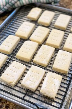 some crackers are on a cooling rack and ready to be baked in the oven