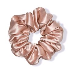 Our best-selling large silk scrunchie featured in 4 gorgeous colors. Giving you an all-day hold without the fuss. Achieve creaseless hair, no split ends, damage-free, & frizz-free hair with our silk hair tie. Stretchy and durable, wrapping comfortably 2-3 times depending on the thickness of your hair. PRO TIP: Use it to preserve your blowout, to sleep in & avoid bed hair, or simply dress up any hairstyle. MATERIAL: 100% high-quality Grade (6A) mulberry silk / 19 momme Made with non-toxic dyes (O