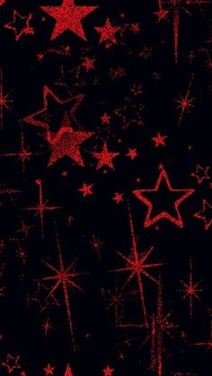 red and black stars on a dark background