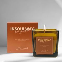 an insoulway candle next to its box