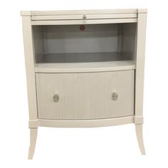 a white cabinet with two drawers on one side and an open drawer on the other