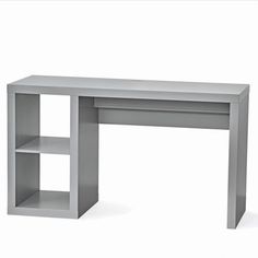 a gray desk with shelves on each side