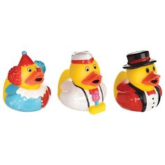 three rubber ducks wearing hats and ties