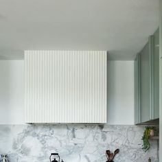 the kitchen is clean and ready to be used as a place for cooking utensils