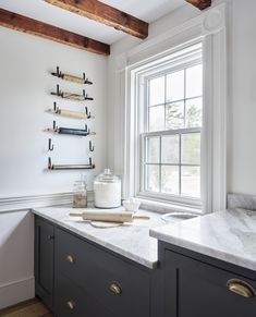 the kitchen counter is clean and ready to be used as a storage area for items