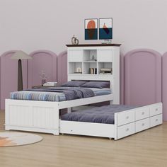 a bed with two drawers underneath it and a bookcase on the top shelf above