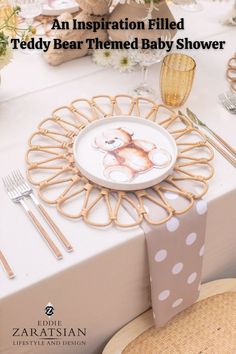 an image of a baby shower themed dinner table setting with place settings and napkins