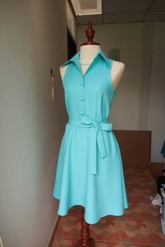 "*DHL shipping upgrade is available at check out process. Shipping part by DHL will take 3-6 days only. Production time may take around 2-3 weeks. If this is in rush you can convo us to make it sooner.:) ♥ Look for other color? Please convo, we can do. In pastel blue color. *Cap sleeve option is available. Please check last image of cap Sleeve style* ITEM DESCRIPTION New casual smart dress for all day to night. Shirt collar/ sleeveless top. Side hidden zipper. Beautiful fabric, swing skirt. Full Fitted Collared Light Blue Dress, Blue Collared Party Dress, Light Blue Fitted Collared Dress, Fitted Blue Collared Dress, Fitted Collared Blue Dress, Blue Collared Dress For Dress Down Occasions, Blue Collared Casual Dress, Retro Collared Party Dresses, Light Blue Sleeveless Dress With Buttons