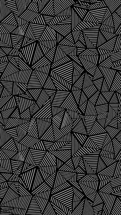 an abstract black and white pattern with diagonal lines in the center, on a dark background