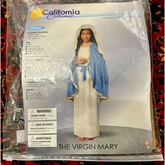 Girls Virgin Mary Costume X- Large New Wt Size: X-Large. 100% Polyester. Dress And Headpiece Are Printed To Look Like Woven Fabric. Headpiece Has Sewn In Elastic For A Secure Fit. Belt Can Be Tied Around The Waist. Dry Cleaned Nw. Now Your Little Girl Can Become The Mother Of God For School Or A Church Play With This Girls Virgin Mary Costume. This Costume Will Make You Look Like Part Of A Nativity Scene. The Gold Trim On The Cape Will Make It Stand Out. Check Out All Of Our Biblical Costumes To Fabric Headpiece, Virgin Mary Costume, Mary Costume, Biblical Costumes, Jester Costume, Medieval Princess, California Costumes, Cat Halloween Costume, Costume Collection