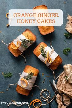 three orange ginger honey cakes on a table