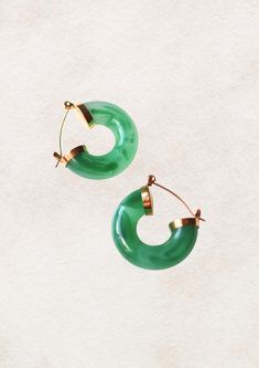 Product Information Introducing our Mermaid's Throne Earrings Jade - a mesmerising pair inspired by the mystical beauty of the ocean. These earrings feature elegant jade accents, symbolising tranquillity and balance, and are designed to reflect the allure of a mermaid's underwater throne. Perfect for both everyday wear and special occasions, the Mermaid's Throne Earrings add a touch of natural beauty and sophistication to any outfit. Product Details Materials: Stainless steel 18K Gold Plated Wat Green Pierced Hoop Earrings For Anniversary, Allergy Friendly, Jewelry Earrings Hoops, Gift For Her, Jade, Color Pop, 18k Gold, Gold Plate, Jewelry Earrings