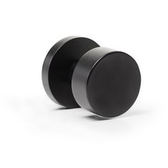 two black round knobs on a white background