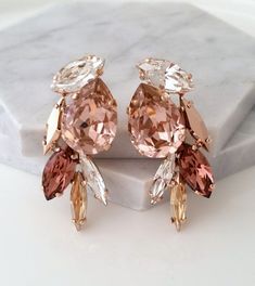 #weddings #jewelry #earrings #bridalearrings #extralargeearrings #chandelierearrings #crystalearrings #swarovskiearrings #blushpinkearrings #clusterearring #bridesmaidsgift #blushcrystal #weddingjewelry #blushwedding #rosegoldearrings #rosegoldstuds Earring Cluster, Blush Necklace, Statement Necklace Wedding, Morganite Necklace, Cluster Earring, Morganite Earrings, Bridal Earrings Studs, Blush Earrings, White Opal Earrings