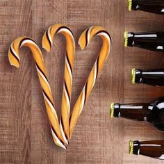 some candy canes and bottles on a table