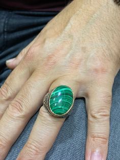 Men Handmade Ring , Malachite Gemstone Ring , Oval Gemstone Ring , Embroidered Ring , Ottoman Jewelry , 925k Sterling Silver Ring . Sent in Gift Package. ★Item Details * Gender : Male / Female * Material : 925K Sterling Silver * Gemstone : Malachite Ring * Total weight : 19 Grams * Stone Size 18x25 mm ✔ Ready to Ship in 1-2 Business Days .. ✔ Shipped to the Worldwide 1-5 business days with free shipping... ✔ The product will be sent to you with a handmade wooden box to avoid any damage during sh Traditional Oval Signet Ring With Polished Finish, Traditional Oval Emerald Ring, Traditional Oval Rings With Polished Finish, Oval Malachite Emerald Ring, Handmade Artisan Oval Emerald Ring, Spiritual Oval Engraved Ring With Gemstone, Spiritual Oval Engraved Gemstone Ring, Spiritual Oval Gemstone Engraved Ring, Unique Oval Gemstone Signet Ring