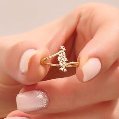 Elevate your style with our 14k Solid Gold Unique Cluster Ring. This exquisite piece is a harmonious blend of vintage charm and contemporary elegance, making it the perfect choice for both special occasions and everyday wear. Ring Details ❥ Gold KT: 14k 18k 10k Solid Gold ❥ Gold Color Options: White, Yellow, Rose Gold ❥ Top Width: 4.30x12.40 mm ❥ Band Width: 1.00 mm ❥ Thickness: 1.15 mm ❥ Gemstone: AAA Grade White Cubic Zirconia ❥ Ready to Ship 4-7 Business Days MORE FROM US Statement Rings: htt Delicate Open Ring Diamond Ring With Accents, Delicate Open Diamond Ring With Accents, Delicate Diamond Ring For Anniversary, Delicate Crystal Ring With Diamond Accents, Delicate Cluster Promise Ring, Delicate Diamond Open Crystal Ring, Elegant 14k Gold Crystal Toe Ring, Delicate Diamond Toe Ring For Anniversary, Delicate Gold Diamond Cluster Ring