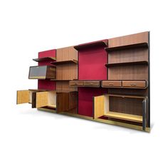 a wall mounted shelving unit with multiple compartments and shelves on each side, in various colors