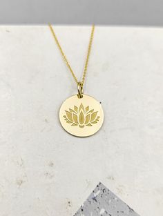 All parcels are shipped in one business day! For a speedy delivery to your address please select the upgraded shipping with a small extra cost. Engraved Lotus Design Necklace - Flower Pendant Necklace - Handmade Lotus Gold Jewelry - Engraved Flower Gold Necklace Engraved Lotus Pendant Necklace made out of 14K Solid Gold. Available only in Yellow Gold finish. An elegant piece of jewelry that is a perfect gift to yourself and your loved ones. Charm Thickness: 0.5mm Jump Ring inner diameter: 4mm Ad Lotus Flower Jewelry, Gold Lotus Flower, Flower Necklace Gold, Lotus Flower Necklace, Yoga Necklace, Lotus Pendant, Engraved Flower, Gold Lotus, Solid Gold Necklace