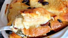 a close up of a plate of food with bread and blueberries on the side