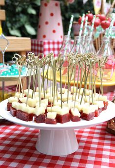 there are many appetizers on the table ready to be eaten at this party