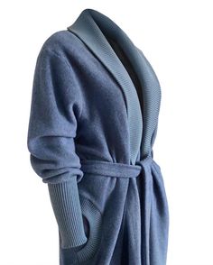 The Melange is a super warm, cozy soft dressing gown, designed with a practical ribbed sleeve, a throw-on-and-go style, great for lounging in at home. Made from 100% Organic Cotton and Merino Wool so tailored for sustainable lifestyle and contributing to a cleaner environment. Product details Fabric - 100% organic brushed fleece cotton Collar, sleeve & pocket ribbing - merino wool & acrylic Tie belt 130cm length Dry Clean recommended ( can machine 30 degrees though it won't look as silky & smooth) Model is a 5'8″ hips 40″ waist 33″ Bust 38 wearing  a S/M, we recommend  S/M size is suitable for 10 -14 size and 16 plus -M/L ( sold out on M/L) For other styles not showing on here please see my Instragram quaintrelle_luxury_loungewear and email for other styles of your interest to sales@quaint Winter V-neck Sleepwear For Lounging, Comfortable Loungewear Cardigan, Cozy Comfy Cardigan For Loungewear, Comfy Cozy Fit Cardigan For Loungewear, Comfy Cozy Loungewear Cardigan, Relaxed Fit Comfortable Outerwear For Lounging, Comfortable Relaxed Fit Outerwear For Lounging, Comfortable Lounging Outerwear, Long Sleeve Cardigan For Winter Lounging