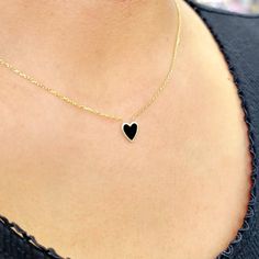 Black Heart Gold Necklace Adjustable Gold and Black heart necklace for women adjustable Elegant Black dainty heart Gold Necklace Made with fine sterling silver 925 yellow gold tone finish. This black Heart gold adjustable necklace is the Perfect gift for weddings, bridal parties, birthdays, holidays Will make the perfect gift for yourself and/or your loved one! Gold and Black heart necklace for women adjustable Black Heart Pendant Necklace With Clavicle Chain, Black Clavicle Chain Necklace For Valentine's Day, Valentine's Day Black Clavicle Chain Necklace, Black Heart-shaped Jewelry With Adjustable Chain, Black Heart Shaped Jewelry With Adjustable Chain, Black Heart Necklace With Adjustable Chain For Valentine's Day, Black Open Heart Necklaces For Valentine's Day, Black Heart Necklace With Adjustable Chain, Black Heart Pendant Necklace With Adjustable Chain