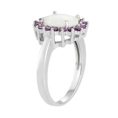 A lab-created opal serves as the focal point, while eye-catching purple cubic zirconia stones add a colorful touch to this gorgeous halo ring. Comes in a gift box. Click on this JEWELRY & WATCHES GUIDE to learn about fit, styles, materials and more!RING DETAILS Width: .55 in. Metal: rhodium-plated sterling silver STONE DETAILS Stone type: lab-created opal Center stone size: 10 mm x 7 mm Shape: oval Setting: prong CUBIC ZIRCONIA DETAILS Total weight: 3/8 ct. Shape: round Color: purple Setting: pr Birthstone Ring With Gemstone Accents In Cubic Zirconia, Birthstone Ring With Cubic Zirconia And Gemstone Accents, White Birthstone Ring With Round Gemstone, White Birthstone Ring With Gemstone, Purple Opal Promise Ring, White Amethyst Gemstone Ring For Anniversary, White Amethyst Promise Ring, White Amethyst Ring For Promise, Elegant Purple Opal Ring For Anniversary