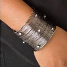 Shimmery Gunmetal Wires Wrap Back And Forth Along A Gunmetal Frame, Creating A Bold Cuff. Glassy White Rhinestones Are Sprinkled Across The Dramatic Cuff For A Glamorous Finish. Sold As One Individual Bracelet. Adjustable Gunmetal Metal Bracelet, Adjustable Gunmetal Metal Bracelets, Elegant Gunmetal Metal Bracelets, Elegant Gunmetal Metal Bracelet, Adjustable Metal Bangle For Party, Wire Cuff Bracelet, Wire Cuff, Feather Bracelet, Metal Cuff Bracelet