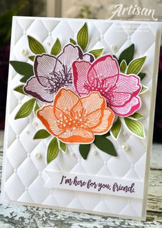 a close up of a card with flowers on it