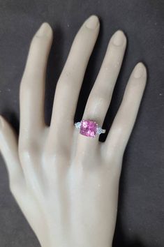 GORGEOUS  vintage 14K WHITE GOLD  engagement ring natural pink tourmaline radiant shape  ,center set natural pink tourmaline radiant shape weight 3.86carat.size 9x8.7mm very nice raspberry color ,nice luster, very lively ,nice cut. clean.sparkly tourmaline. side two natural round cut   diamonds total weight 0.55ct. Size 4mm H-SI1 ring size 5.5Resizable Appraisal available Retail value $5750 net. Pink Cushion Cut Morganite Jewelry, Pink Fine Jewelry For Wedding With Accent Stones, Pink Tourmaline Jewelry With Accent Stones, Gia Certified Emerald Cut Pink Jewelry, Gia Certified Pink Emerald Cut Jewelry, Pink Emerald Cut Gia Certified Jewelry, Gia Certified Cushion Cut Pink Ring, Pink Morganite Rings Gia Certified, Pink Morganite Gia Certified Rings