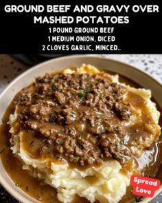 a plate with mashed potatoes covered in gravy and topped with ground beef