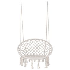 a white hanging chair with tassels