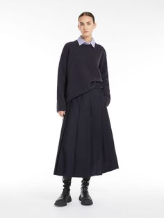 Find MAX MARA Wool Pleated Skirt on Editorialist. Long skirt in warm wool-blend flannel fabric featuring pressed pleat detail and in-seam side pockets. The unlined model boasts a flared fit, topstitched waist and a prong buckle-fastening strap at the side. Concealed zip fastening at the side. Fall Workwear Skirt With Box Pleat, Box Pleat Skirt For Workwear In Fall, Wool Flared Skirt For Work, Wool Flared Skirt Bottoms For Workwear, Full Wool Skirt For Workwear, Wool Full Skirt For Workwear, Wool Full Skirt For Work, Fall Workwear Asymmetrical Pleated Skirt, Wool Skirt With Pockets For Work