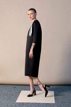 "With this beautiful Minimalist Dress we introduce our fashion for Spring 2019 ! This stylish black dress is cut in the the brand's most recognizable silhouette - the laid-back approach to elegance. The design has straight, elegant silhouette - it is our go-to for effortless, easy-to-wear pieces. Wear your occasion dress with sandals, high heels, ballerinas. ITEM DETAILS: - straight line - side pockets - shoulder bow decorations - custom orders: yes - color: black and creamy COMPOSITION AND CARE Winter Dress Party, Bow Decorations, Stylish Black Dress, Cocktail Dress Elegant, Neoprene Dress, Minimalist Dress, Dress Office, Elegant Black Dress, Dress Work