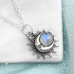 Sun and moon face Necklace with Moonstone gem. Genuine gemstone. Made of sterling silver. Metal: Solid sterling silver Pendant size: 20mm Necklace length: 44-48cm Gemstone: Rainbow Moonstone Gemstone color: White ✈ Free Shipping (USPS) 🎁 Free Gift Box ↻ 60 Days Return ⌛ 24 Handling Time ** GET 15% OFF COUPON ** Visit 👉 boho-magic.com/join Join and get coupons, exclusive offers, updates, and more surprises! ** ALSO IN OUR SHOP ** Shop▸ https://etsy.me/2rT0tbC Most Loved▸ https://etsy.me/2AcpzH2 Celestial Sun And Moon Sterling Silver Necklace, Spiritual Moon Jewelry With Sun And Moon Design, Sterling Silver Sun And Moon Pendant Charm Necklace, Sterling Silver Sun And Moon Spiritual Necklace, Sterling Silver Charm Necklace With Sun And Moon Design, Sterling Silver Pendant Necklace With Sun And Moon Design, Sterling Silver Spiritual Necklace With Sun And Moon Design, Silver Pendant Jewelry With Sun And Moon Design, Spiritual Sterling Silver Necklace With Sun And Moon Design