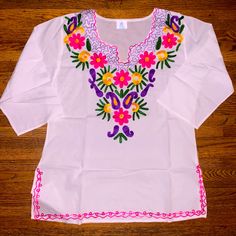 Brand New Blusa Mexicana. Beautiful Embroidered Details. Tag Says One Size Fits All But It Actually Is A Medium To Large Size Summer Embroidered Tops With 3/4 Sleeves, Summer Tops With Floral Embroidery And 3/4 Sleeve, Summer Floral Embroidery 3/4 Sleeve Tops, Multicolor Embroidery Long Sleeve Vacation Tops, White Embroidered Blouse With 3/4 Sleeves, Embroidered Tops With 3/4 Sleeve For Vacation, Traditional Summer Tops With 3/4 Sleeves, Casual Pink Embroidered Top For Beach, White Floral Embroidered 3/4 Sleeve Blouse