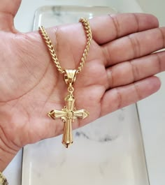 Gold Crucifix Necklace for Men. Cross For Men Made of Real 14k Layered and Bonded Gold Over Semiprecious Metal. High Quality Necklace, Lifetime Replacement Guarantee Chain is a 4mm Cuban Link. The Pendant is Medium Sized at 43mm high and 32mm width. Lifetime Replacement Guarantee Mens Necklace Gold Pendant, Cross Necklace For Men Gold, Chain With Cross Men, Gold Rosary Necklace For Men, Gold Cross Chain For Men, Gold Cross Pendant For Men, Gold Cross Necklace Mens, Cross Chain Men, Gold Cross Necklace Men