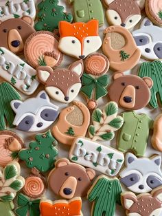 many decorated cookies with different designs on them