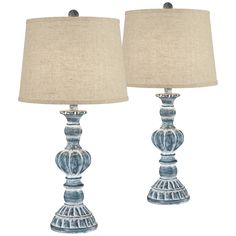 pair of blue glass table lamps with linen shades