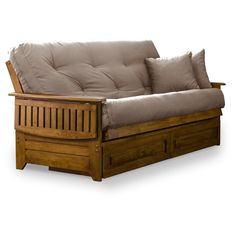 a wooden futon bed with blue sheets and pillows on it's back end